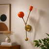 Mid-Century Modern Wall Sconce: Brass Arms, Orange Enamel Shades